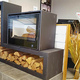 Espace Cheminées 66 Perpignan vend un nouveau poêle à bois avec support à bûches design. Espace Cheminées 66 Perpignan vend un nouveau poêle à bois avec support à bûches design.
